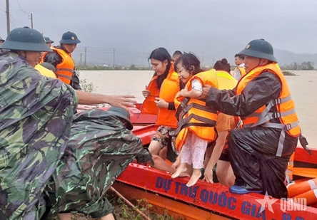 Military troops support flood-hit people